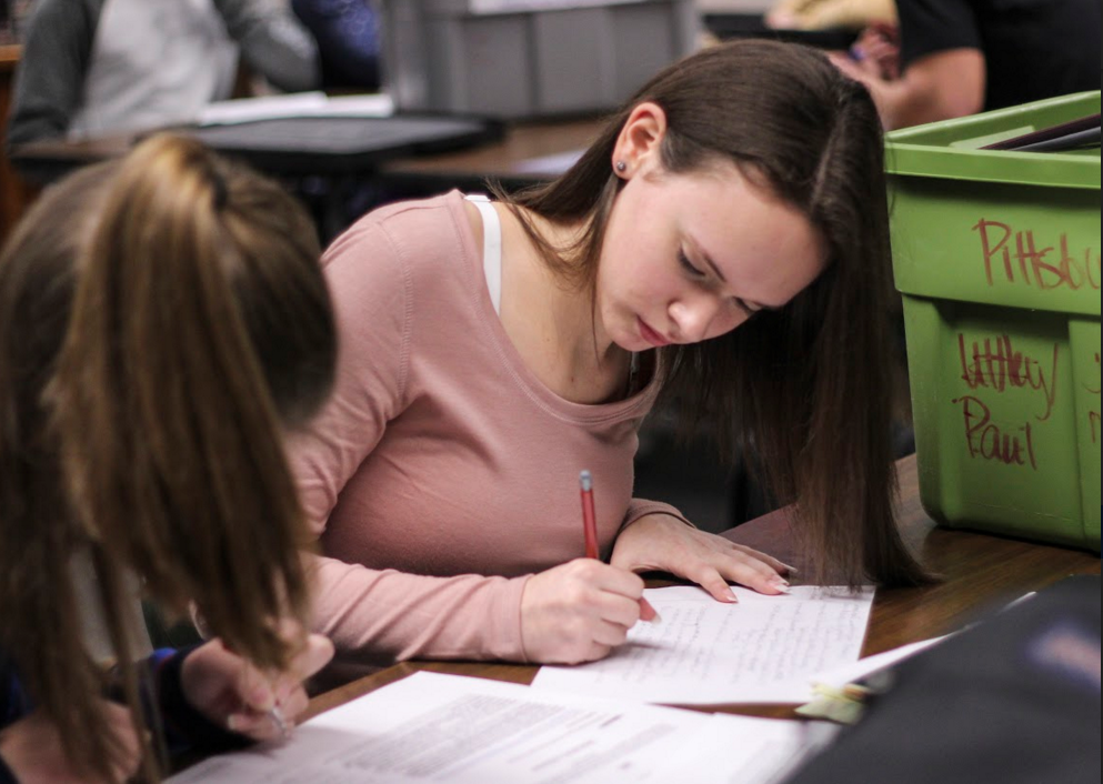 As a new member of debate, freshman Jessica Neef in enjoying the class.