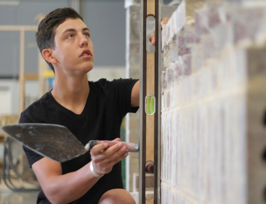 Senior Coltin Oehme prepares for the World of Concrete and Masonry Tradeshow held in Las Vegas in January. "I'm building projects right now, [preparing for Vegas]," Oheme said. "I'm practicing different designs and different laying techniques in case the project they give me is a litter tougher than I think." Oheme has been enrolled in the Masonry program for two years.