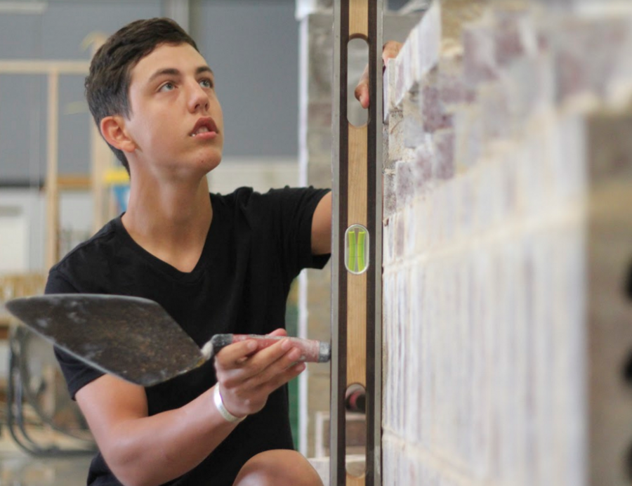 Senior Coltin Oehme prepares for the World of Concrete and Masonry Tradeshow held in Las Vegas in January. Im building projects right now, [preparing for Vegas], Oheme said. Im practicing different designs and different laying techniques in case the project they give me is a litter tougher than I think. Oheme has been enrolled in the Masonry program for two years.