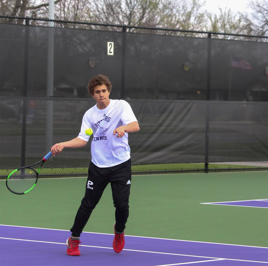 Sophomore+Dakota+Caudle+returns+a+serve+during+his+singles+match+against+Chanute.+I+think+its+great+that+tennis+is+getting+more+publicity+at+PHS%2C+Caudle+said.+Im+really+happy+with+it+but+Im+always+looking+to+improve+in+all+ways.