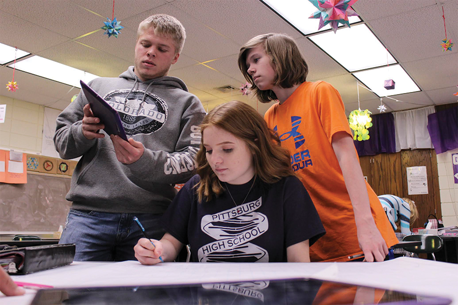 Sophomore Trevor Stover, junior Alesha Lawson and freshman Jordan McDaniels study together for their upcoming final. 