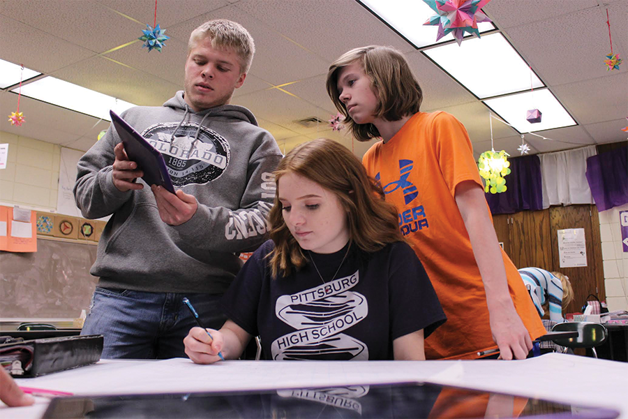 Sophomore Trevor Stover, junior Alesha Lawson and freshman Jordan McDaniels study together for their upcoming final.