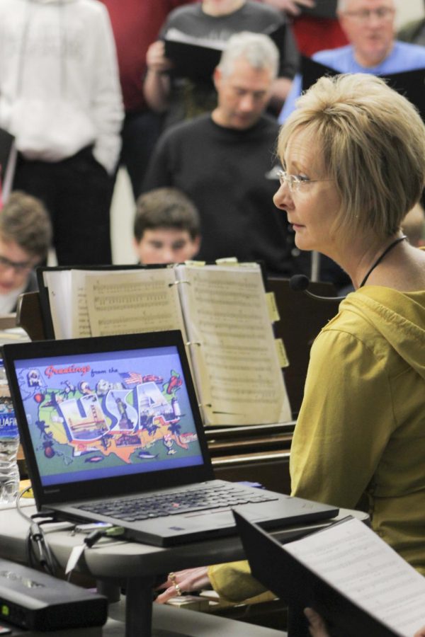 Choir director Susan Laushman leads the last rehearsal before the 10th annual multigenerational choir concert. This years theme, U.S. Travel Log, featuring son selections from each state. 