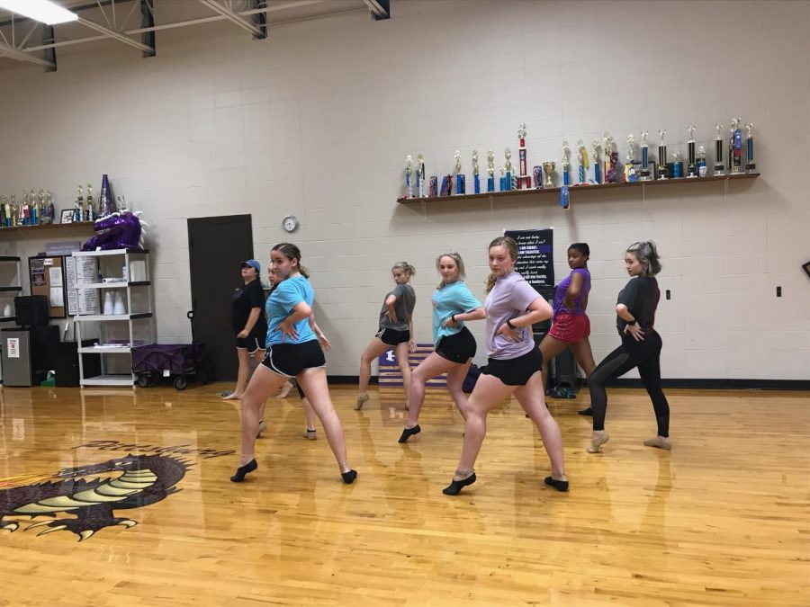 The dance team practicing their routine in the morning.  PHOTO BY SARAH ALCANTAR