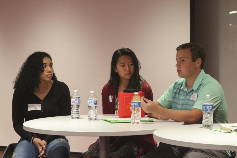 Sophomores Shi Ross, Joy Lee and Owen Miller speak at Pitt States annual banned books panel. Photo by Francisco Castenada