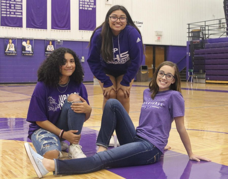 Female athletes Shi Ross, Daphine Samayoa and Natalie Talent are members of the first all-girls soccer team. PHS is also adding girls wrestling. 