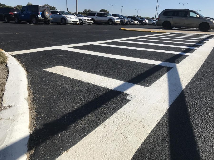 Parking stalls and crosswalks are now clearly marked after the paving process was completed.