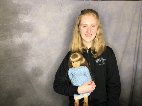 Sophomore Kassi Burns poses with her first American Girl Doll.