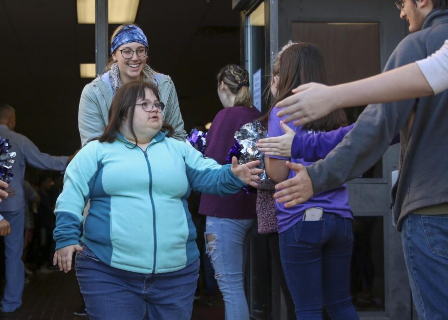 As athletes exited the building to compete at the bocce Special Olympics, students and staff gathered to cheer on the athletes. This was PHSs first time hosting the bocce event. 