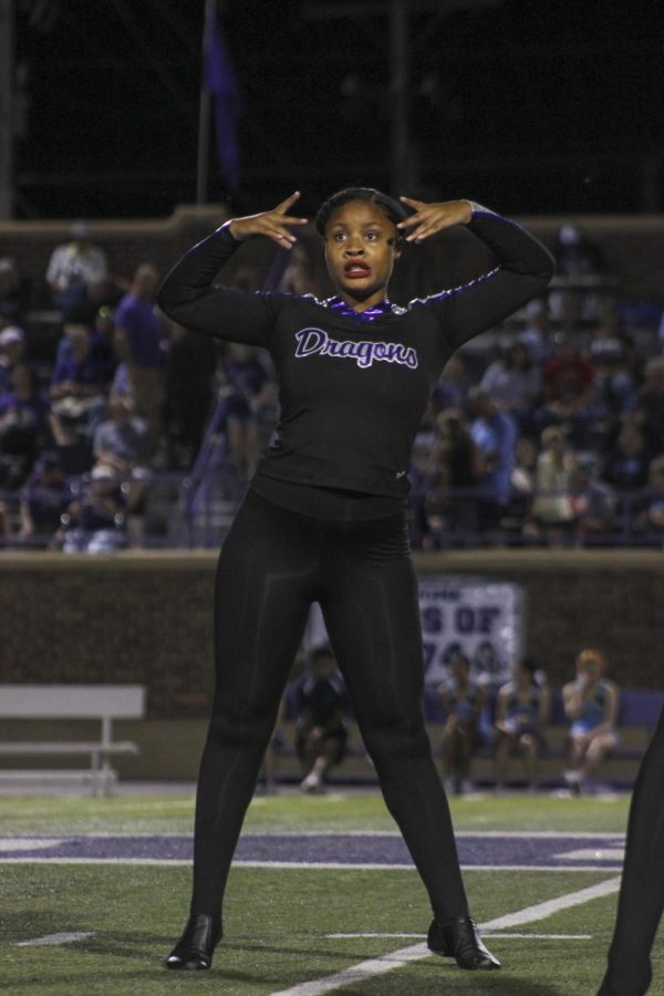 Junior I'sis Thomas dances on the halftime field during the halftime show on Oct. 19