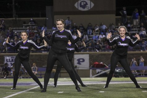 Dance team hires new coach midseason