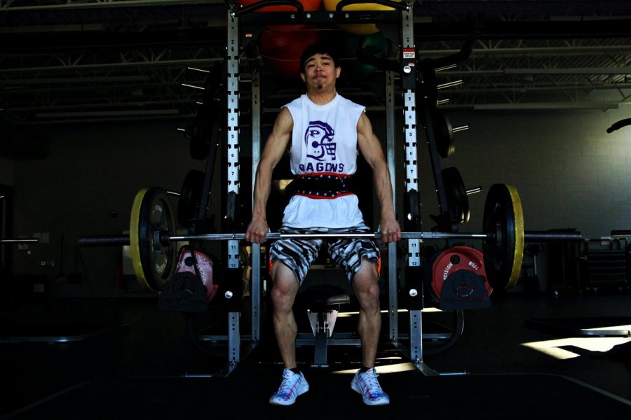 Senior Jason Campbell completes a power clean. His PR for power clean is 225 lbs.