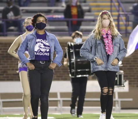 Seniors Emma Annan-Noonoo (left) and Sarah Stebbins (right) prepare to conduct