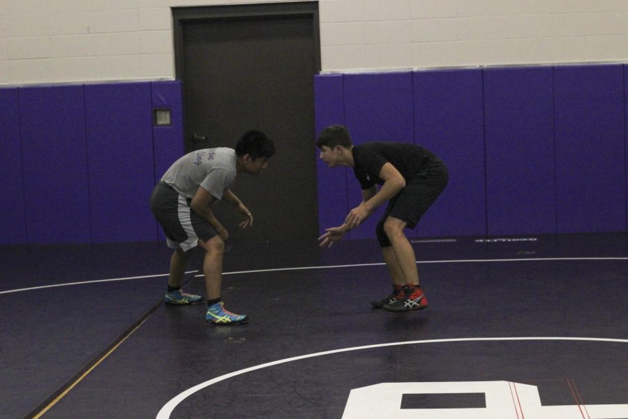 Alex Averado (left) practicing mid level takedowns on his partner Corbin McIntier (right) on Tuesday Oct.13th at open mat.