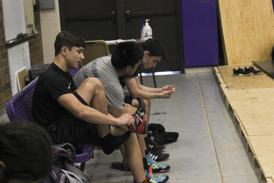 Corbin McIntier, Alex Averado, and Zachary F.  getting ready for open mat on Tuesday, Oct. 13.