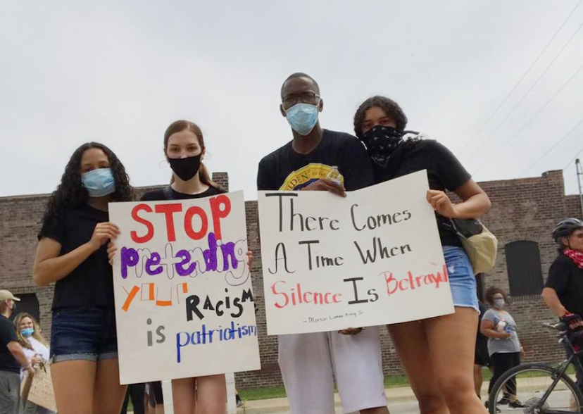 Senior Jaya Minniefield (right) protests for the BLM movement.