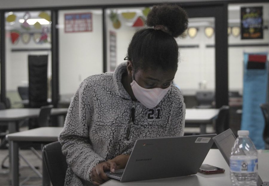 Senior Jasmine Carters works on a speech in Julie Laflens speech class. Carter is on a reduced schedule and works at New Hope and averages at least 30 hours a week. 