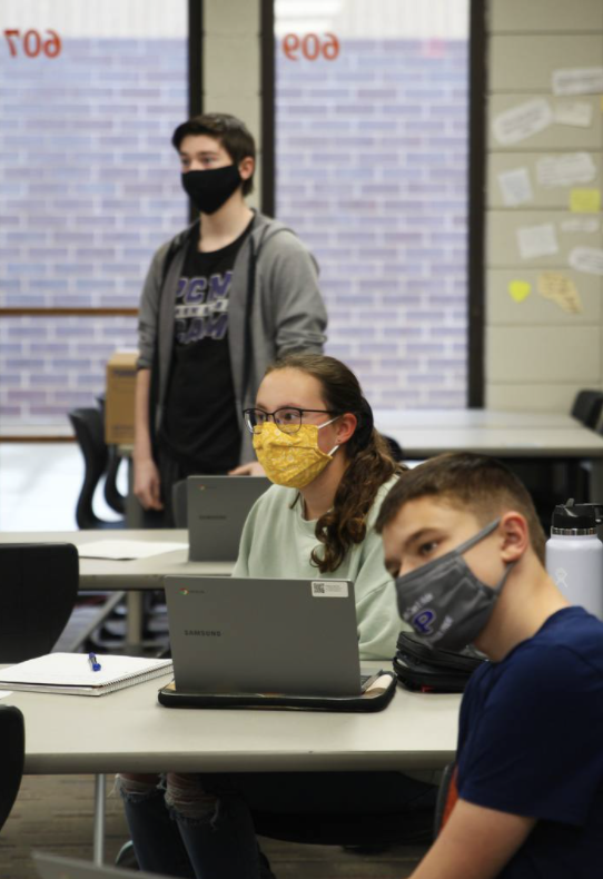 Photo above is students from the debate class practicing social distancing. 