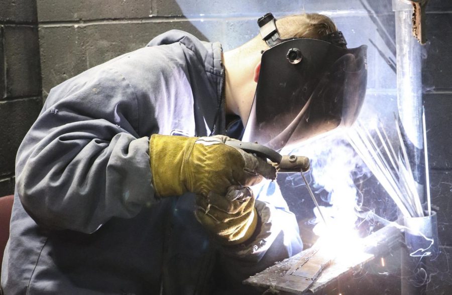 Senior Zane Decker completes a weld at the welding class at CTEC 