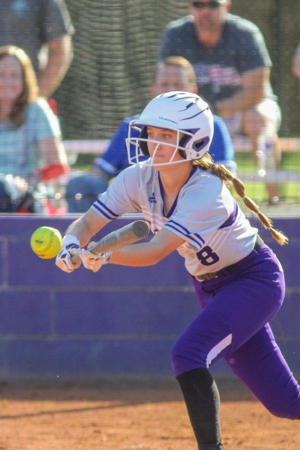 Junior Molly Garzone bunts the ball during a game against Riverton.