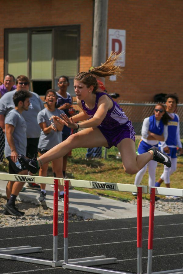 Senior Sarah Stebbins competes in the 300m hurdles at the varsity Columbus meet on Tuesday, April 20th.