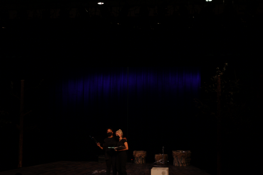 Aunyx Estes(on the left) and  Mallory Womeldorff(on the right) on stage during a light test.