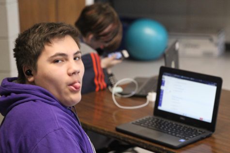 Freshman, Lucas Hudson, works on a math assignment in Rashell Yockeys math class on April 14, 2023.