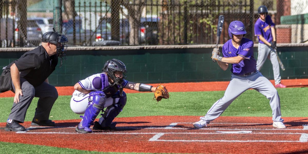 Senior Webb Fern catches a called strike from pitcher and junior Jett Burgess. 