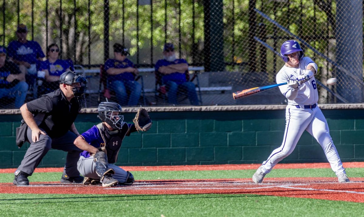 Senior Tucker Akins hits a line-drive into right field. 