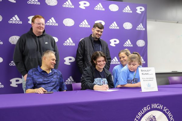 Shaleigh Kunkler signs her letter of intent to Columbia University on Jan. 31. Photo provided by Maddy Robison