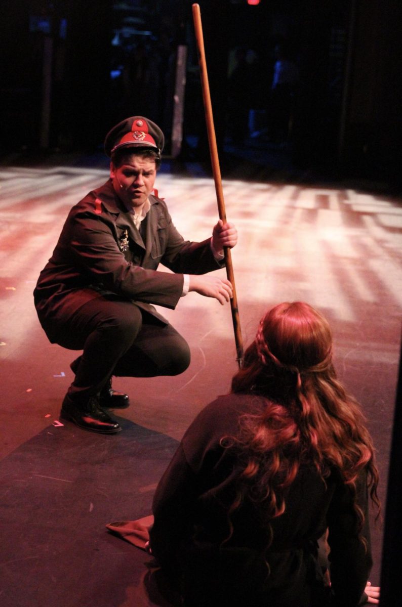 Junior Townes Sullivan and Senior Jocelyn Ouellette play Gleb Vaganov and Anya for the PHS spring show Anastasia. "I played Gleb, and my favorite part is the challenge it provided me," Sullivan said. "It is hard to play someone conflicted, and I enjoy a challenging character. I love being in PHS Theater. There are many factors why, but the highest and most important one is the people."
